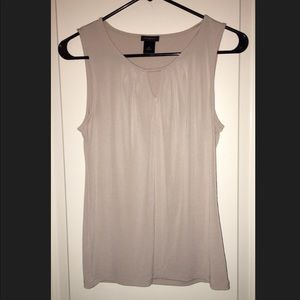 Sleeveless cream colored camisole